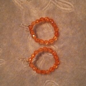 Handmade iridescent orange small hooped fun, colorful, and minimalist earrings